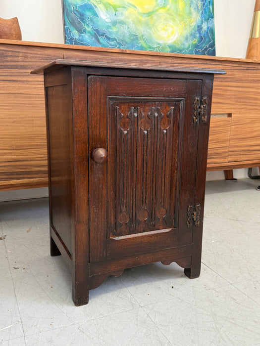 Vintage UK Imported Accent Table or Side Cabinet with Welsh Influences Carved Possibly Oak Door with Drop Hinges Dark Stained Wood