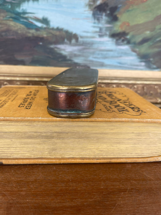 19th Century Possibly Dutch Brass and Copper Toned Snuff Box with Figural Tavern Scene and "T is Niet Anders" Inscription.