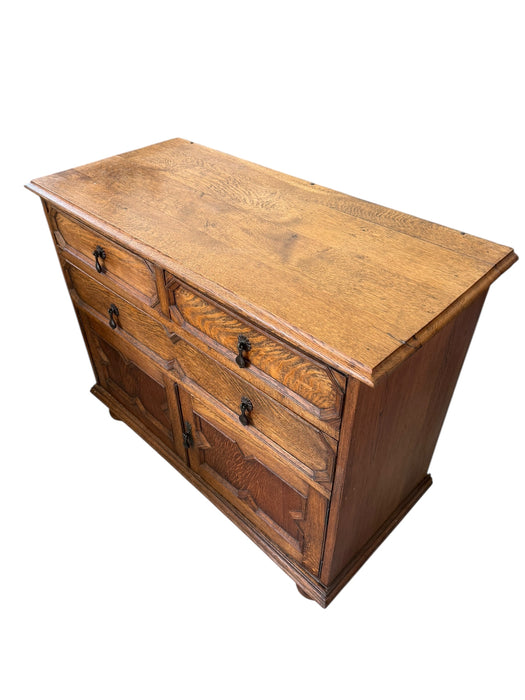 Early 20th Century Antique Jacobean Style English Cabinet with Oak Construction and Metal Drop Pulls