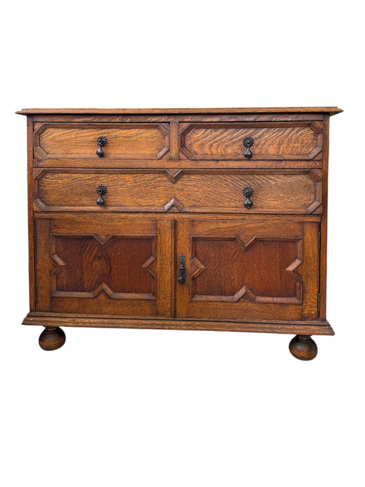 Early 20th Century Antique Jacobean Style English Cabinet with Oak Construction and Metal Drop Pulls