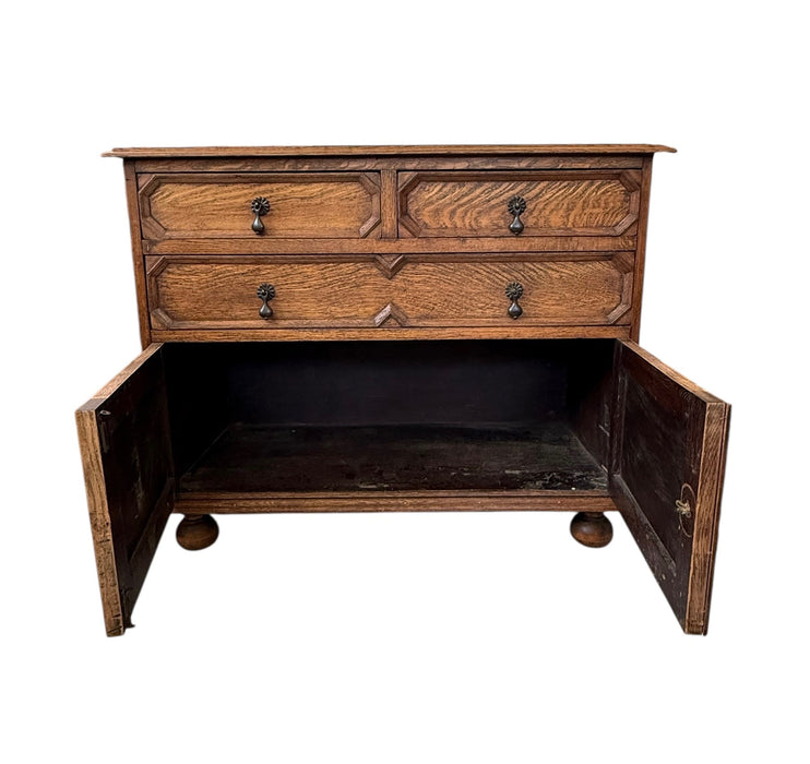 Early 20th Century Antique Jacobean Style English Cabinet with Oak Construction and Metal Drop Pulls