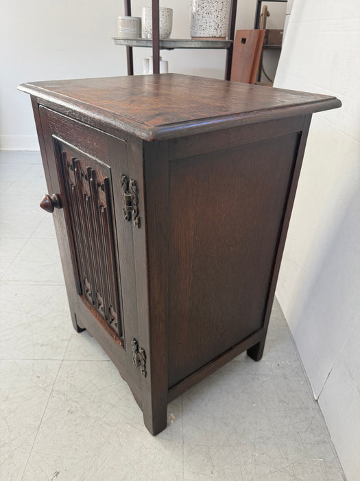 Vintage UK Imported Accent Table or Side Cabinet with Welsh Influences Carved Possibly Oak Door with Drop Hinges Dark Stained Wood