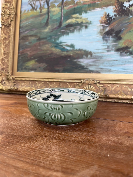 Vintage Bat Trang Vietnam Hand-Painted Ceramic Bowl with Green Relief
Glaze and Floral Interior Design.
