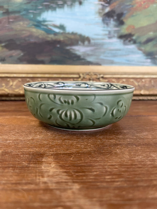 Vintage Bat Trang Vietnam Hand-Painted Ceramic Bowl with Green Relief
Glaze and Floral Interior Design.
