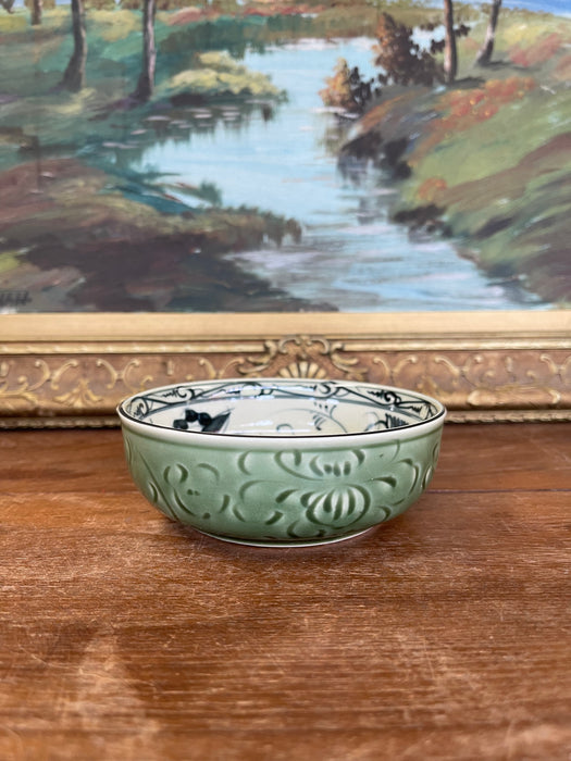 Vintage Bat Trang Vietnam Hand-Painted Ceramic Bowl with Green Relief
Glaze and Floral Interior Design.