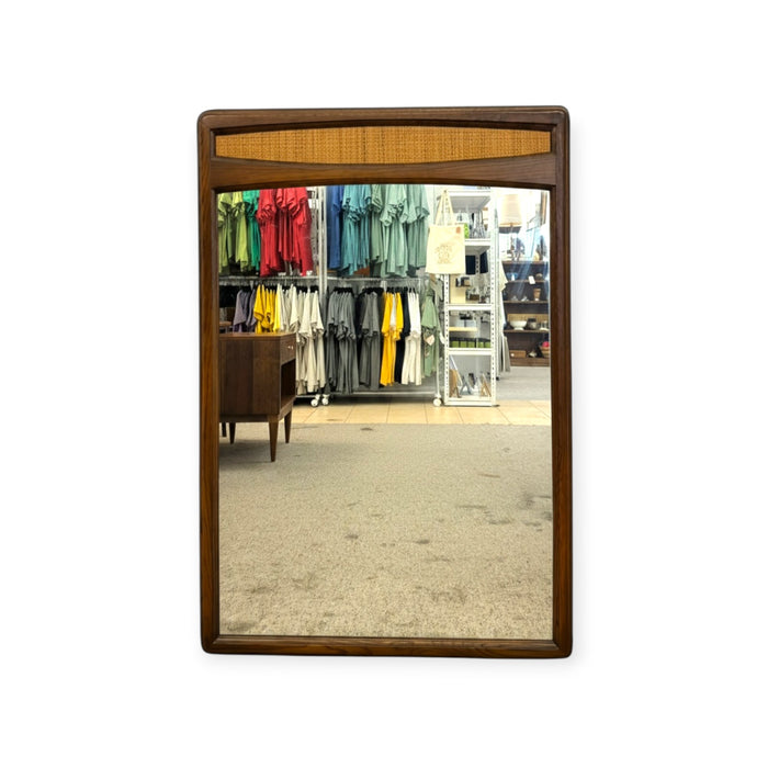 Vintage Mid-Century Modern Solid Wood Wall Mirror with Woven Cane Accent.