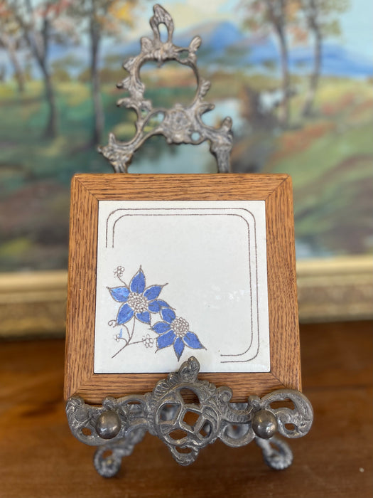 Vintage Handcrafted Ceramic Tile with Likely Oak Frame and Blue Floral Motif, Made in USA.