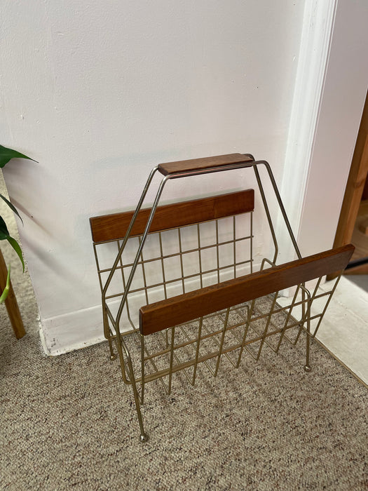 1960s Mid-Century Modern Brass Toned Wire and Wood Magazine Rack with Sculptural Handle.