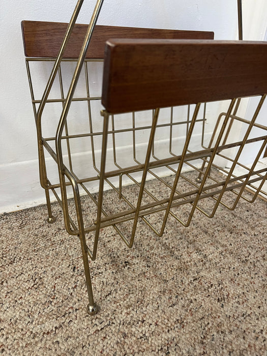 1960s Mid-Century Modern Brass Toned Wire and Wood Magazine Rack with Sculptural Handle.
