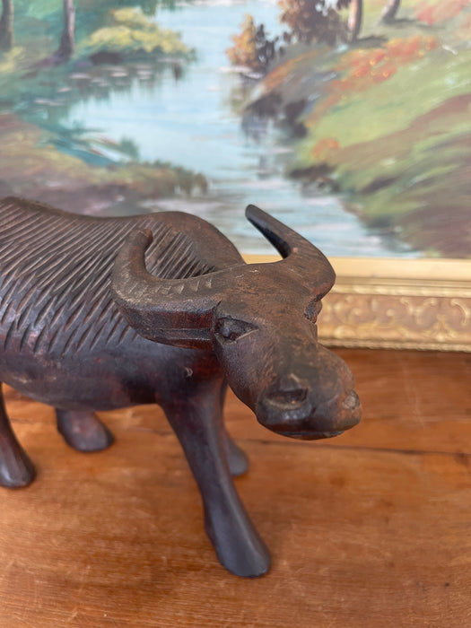 Vintage Hand-Carved Wooden Water Buffalo Sculpture with Textured Detailing.