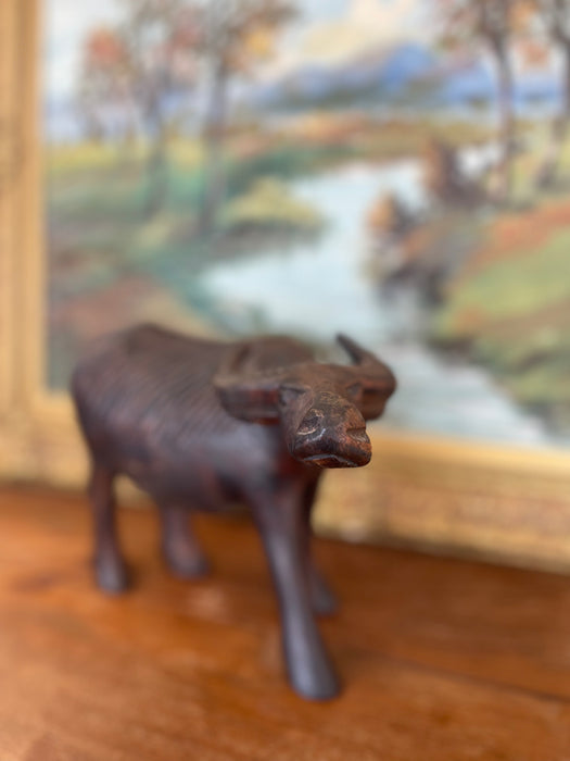Vintage Hand-Carved Wooden Water Buffalo Sculpture with Textured Detailing.