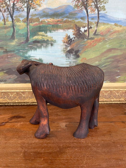 Vintage Hand-Carved Wooden Water Buffalo Sculpture with Textured Detailing.