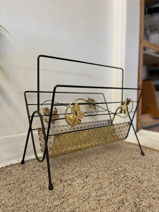 Mid-Century Modern Black Wrought Iron and Brass Toned Magazine Rack with Leaf Motif