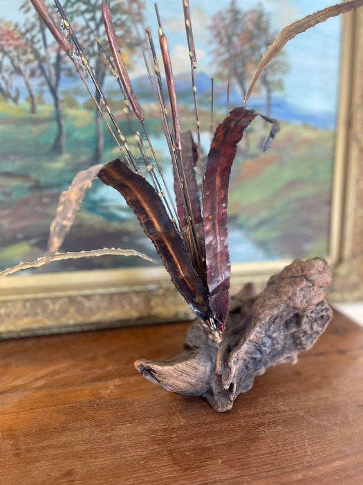 Mid-Century Curtis Jere Style Brutalist Cattail Sculpture in Welded Copper and Brass Toned metals on Driftwood Base.