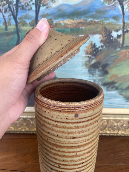 Vintage Hand-Thrown Studio Pottery Lidded Jar with Speckled Glaze and Ribbed Texture.