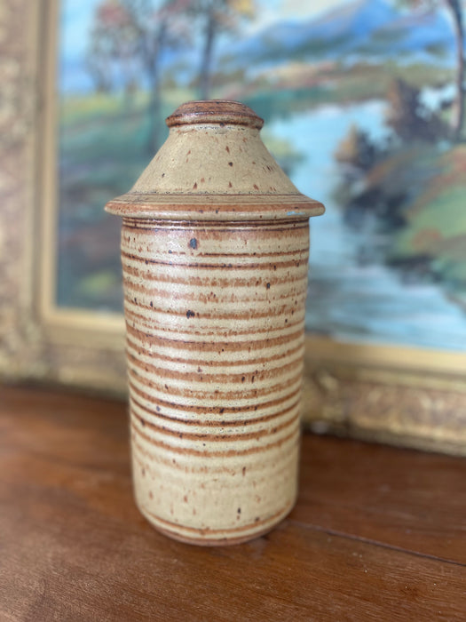 Vintage Hand-Thrown Studio Pottery Lidded Jar with Speckled Glaze and Ribbed Texture.