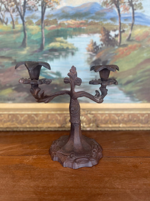 Possibly 19th Century Ornate Cast Iron Double-Arm Candelabrum with Floral Bobeches and Scroll Base.