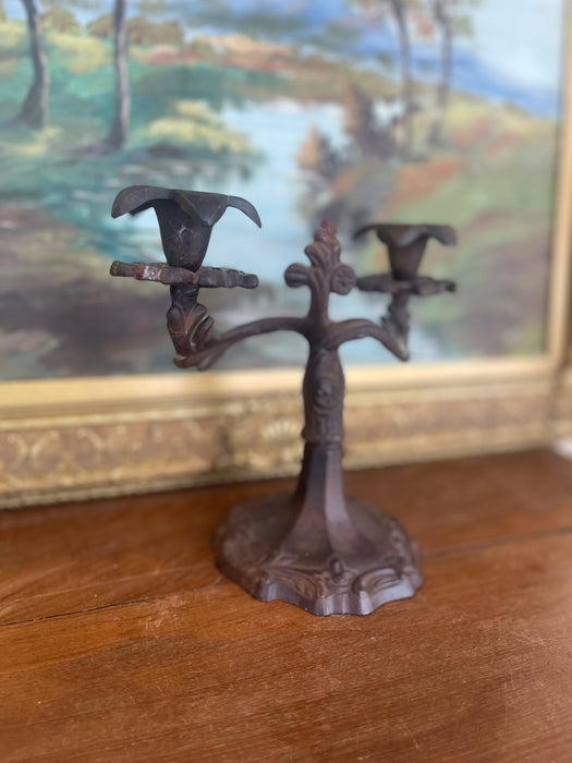 Possibly 19th Century Ornate Cast Iron Double-Arm Candelabrum with Floral Bobeches and Scroll Base.