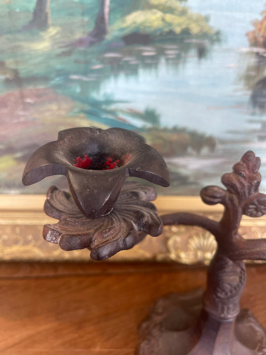 Possibly 19th Century Ornate Cast Iron Double-Arm Candelabrum with Floral Bobeches and Scroll Base.