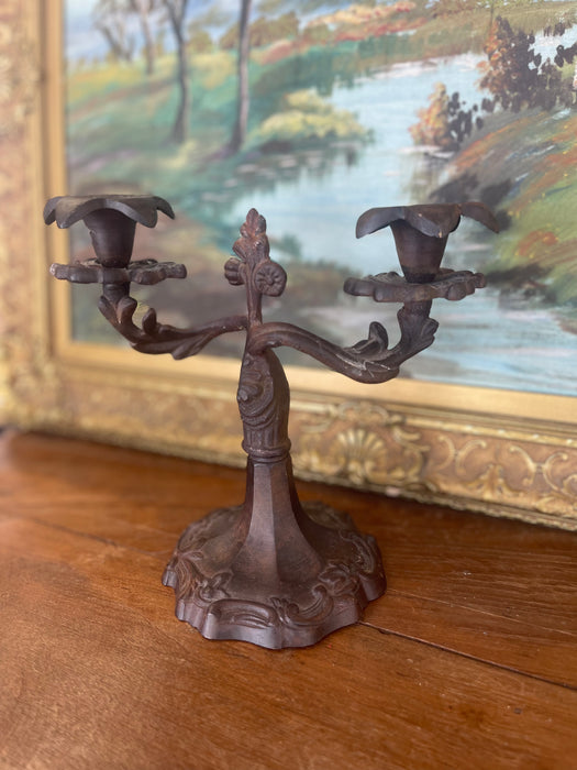 Possibly 19th Century Ornate Cast Iron Double-Arm Candelabrum with Floral Bobeches and Scroll Base.