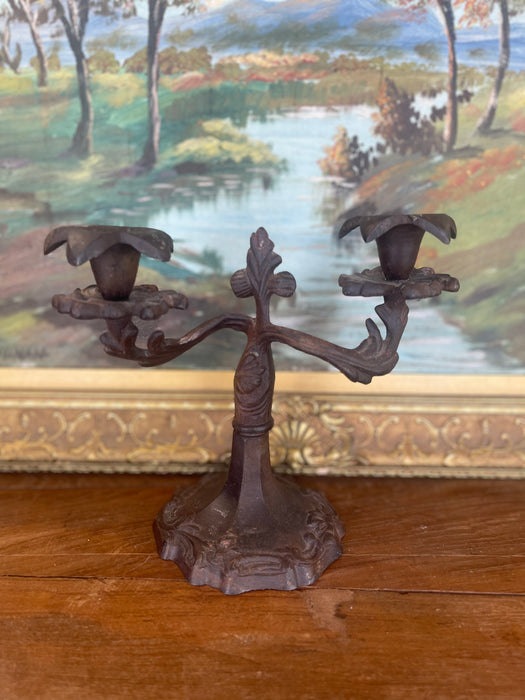 Possibly 19th Century Ornate Cast Iron Double-Arm Candelabrum with Floral Bobeches and Scroll Base.