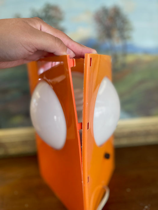 1970s Space Age Triangular Table Lamp in Orange Plastic with White Glass Domes.