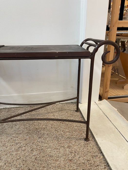 Vintage Hand-Carved Wood and Wrought Iron Console Table with Tribal Motifs and Scrollwork Arms