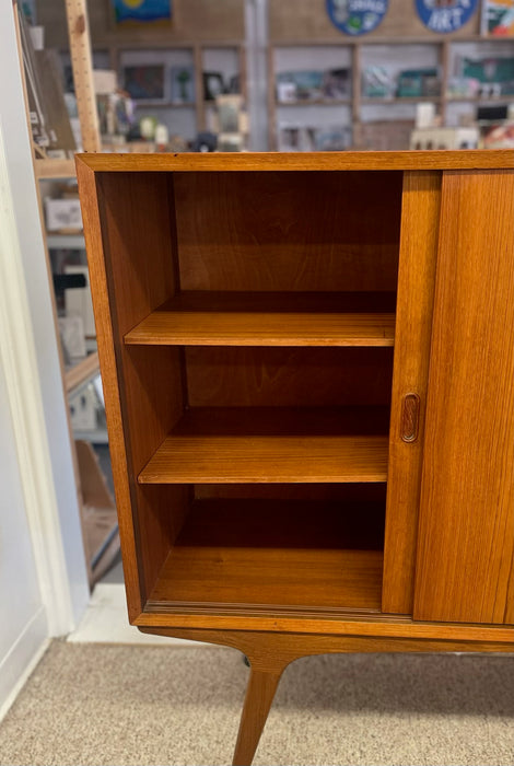 Mid-Century Danish Modern Likely Teak Credenza with Sculpted Base, Likely Rosewood Drawer Fronts with Brass toned Pulls