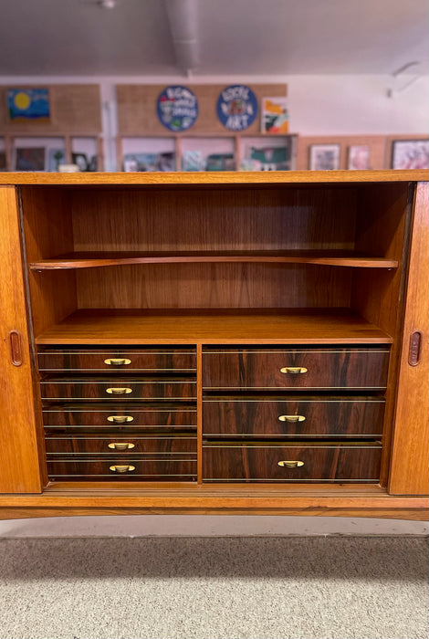 Mid-Century Danish Modern Likely Teak Credenza with Sculpted Base, Likely Rosewood Drawer Fronts with Brass toned Pulls