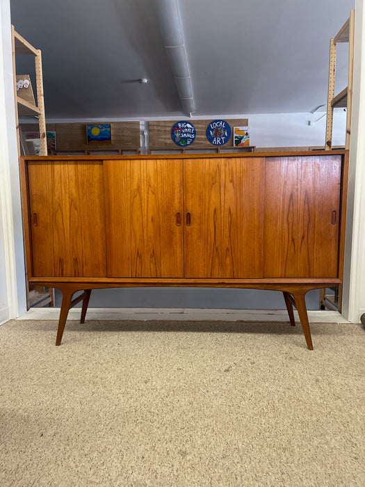 Mid-Century Danish Modern Likely Teak Credenza with Sculpted Base, Likely Rosewood Drawer Fronts with Brass toned Pulls