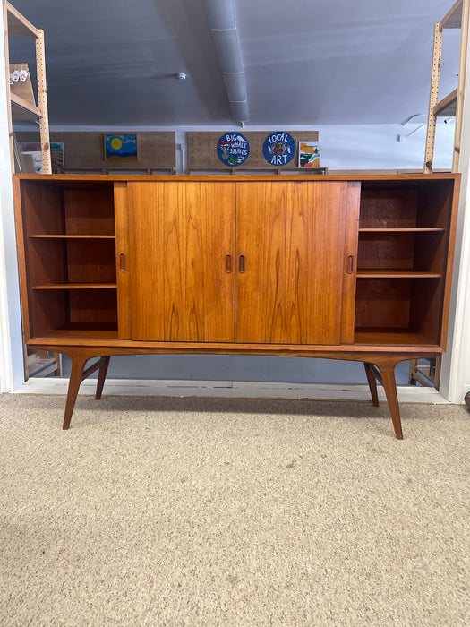 Mid-Century Danish Modern Likely Teak Credenza with Sculpted Base, Likely Rosewood Drawer Fronts with Brass toned Pulls
