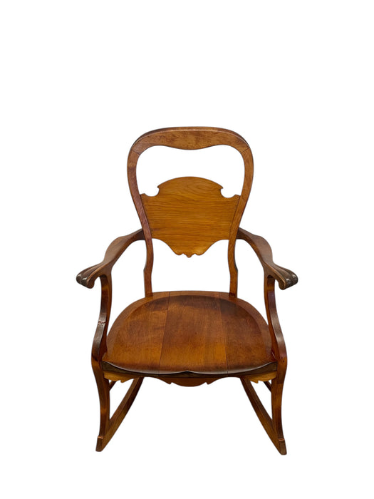 Likely Antique Victorian Style Solid Wood Rocking Chair with Carved Arms and Floral Cushion