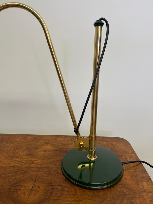 Vintage Adjustable Green and Brass Toned Desk Lamp with Articulated Arm and weighted base.