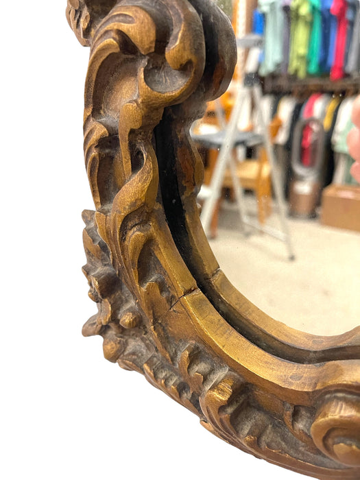 French Louis XV Style Carved Giltwood Wall Mirror with Shell Crest and Floral Details