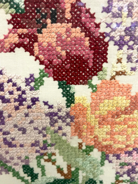 Vintage Framed Floral Cross-Stitch Textile Art - Hand-Embroidered Needlework in Wooden Frame.