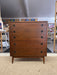 Likely 1960s Mid-Century Modern Possibly Walnut Highboy Dresser with Recessed Brass Toned Pulls and Tapered Legs
