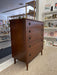 Likely 1960s Mid-Century Modern Possibly Walnut Highboy Dresser with Recessed Brass Toned Pulls and Tapered Legs