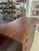 Likely 1960s Mid-Century Modern Possibly Walnut Highboy Dresser with Recessed Brass Toned Pulls and Tapered Legs