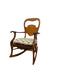 Likely Antique Victorian Style Solid Wood Rocking Chair with Carved Arms and Floral Cushion
