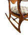 Likely Antique Victorian Style Solid Wood Rocking Chair with Carved Arms and Floral Cushion