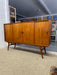 Mid-Century Danish Modern Likely Teak Credenza with Sculpted Base, Likely Rosewood Drawer Fronts with Brass toned Pulls