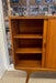 Mid-Century Danish Modern Likely Teak Credenza with Sculpted Base, Likely Rosewood Drawer Fronts with Brass toned Pulls