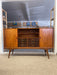 Mid-Century Danish Modern Likely Teak Credenza with Sculpted Base, Likely Rosewood Drawer Fronts with Brass toned Pulls