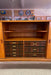 Mid-Century Danish Modern Likely Teak Credenza with Sculpted Base, Likely Rosewood Drawer Fronts with Brass toned Pulls