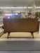 Mid-Century Danish Modern Likely Teak Credenza with Sculpted Base, Likely Rosewood Drawer Fronts with Brass toned Pulls
