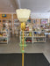 Mid-Century Modern Brass Toned Torchiere Floor Lamp with Sculptural Patinated Metal Accent and Ribbed Glass Diffuser