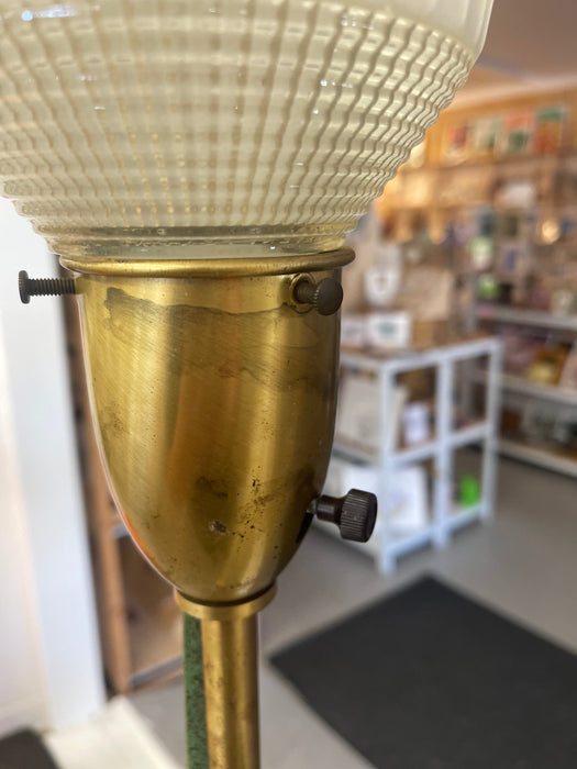 Mid-Century Modern Brass Toned Torchiere Floor Lamp with Sculptural Patinated Metal Accent and Ribbed Glass Diffuser