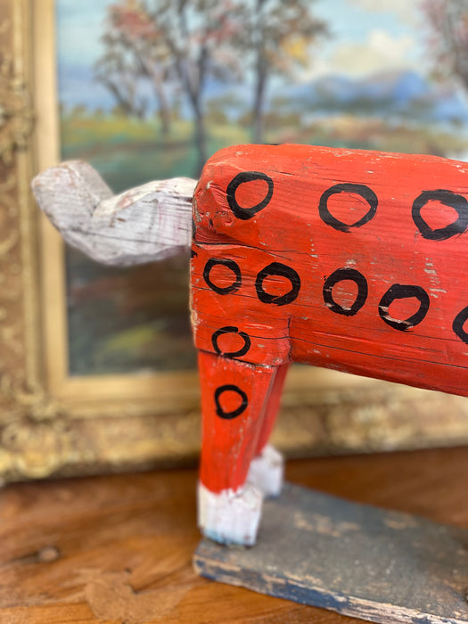 Primitive American Folk Art Painted Wood Horse Sculpture in Red and White with Black Circle Motif