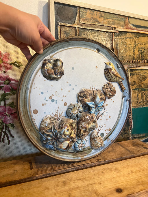 Signed Vintage handmade mid century modern retro style abstract pottery decorative floral wall art with bird details.