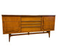 Vintage Bassett Monterey Mid-Century Modern Walnut 9 Drawer Dresser with Rosewood ‘X’ Inlays by Leo Jiranek Circa 1963